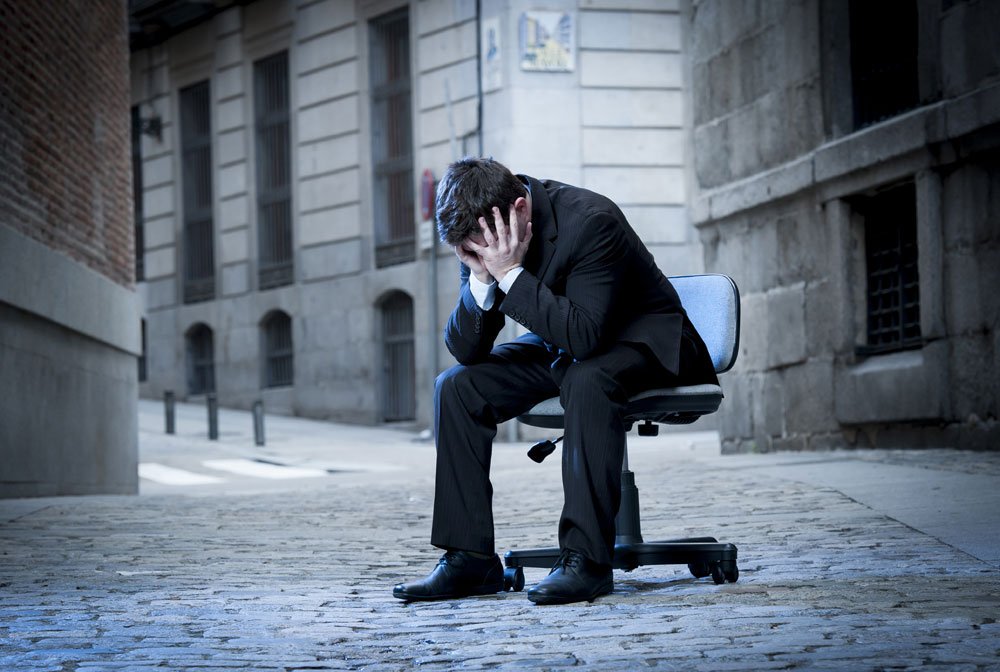 Man crying after losing his job