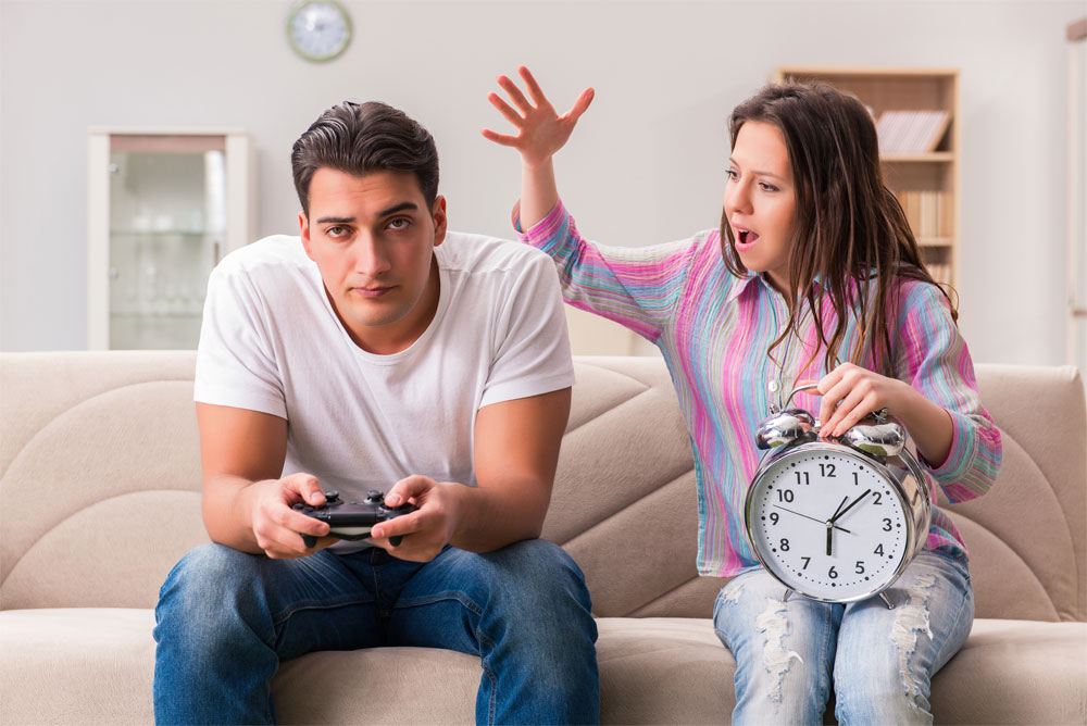 Woman angry at her man for wasting his life playing video games