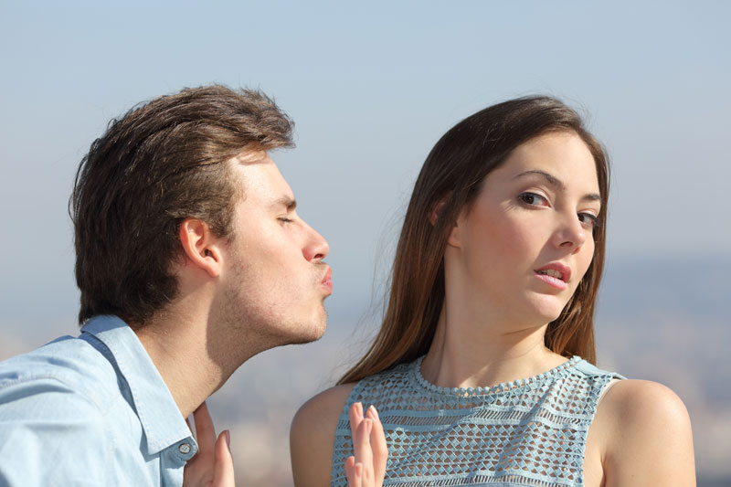 Woman pretending to reject a guy to test his confidence